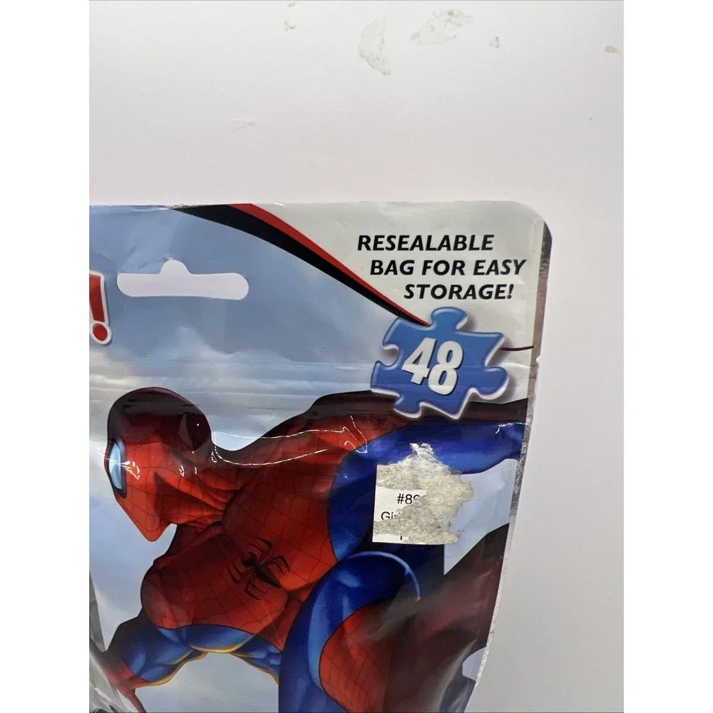 Puzzle On The Go: The Amazing Spider-Man 2,‎ 48 Pieces, Resealable Bag.